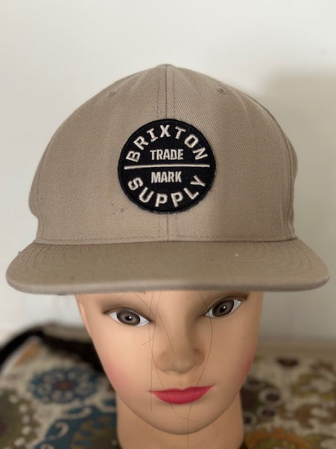 Beige Hat  patch on front .